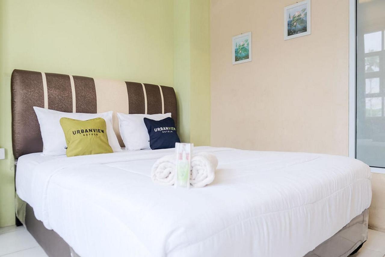 Urbanview Hotel Ta Ke Jelutung Puncak Джамби Экстерьер фото