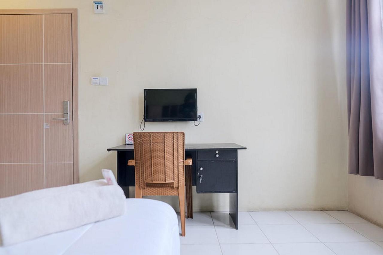 Urbanview Hotel Ta Ke Jelutung Puncak Джамби Экстерьер фото