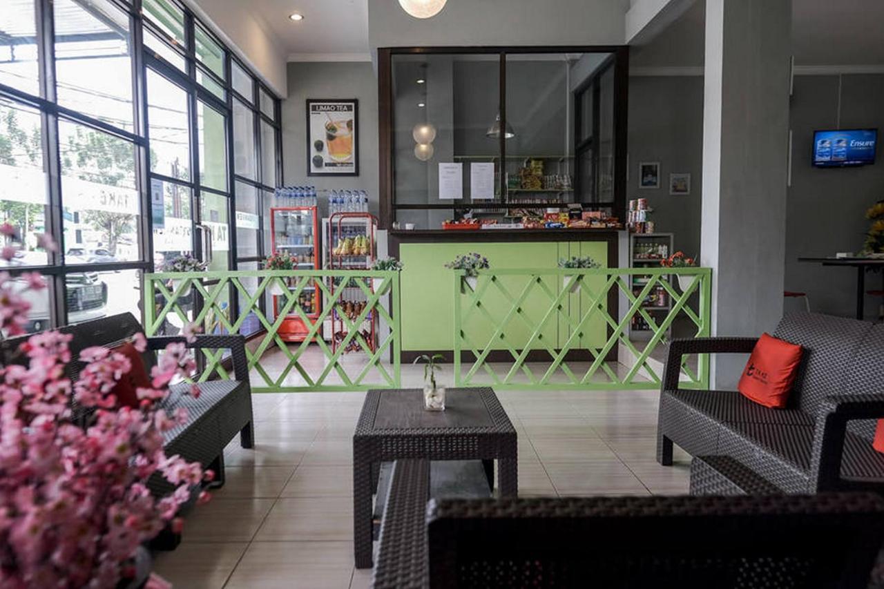 Urbanview Hotel Ta Ke Jelutung Puncak Джамби Экстерьер фото
